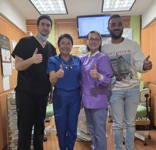 young-girl-with-clear-aligners dental team